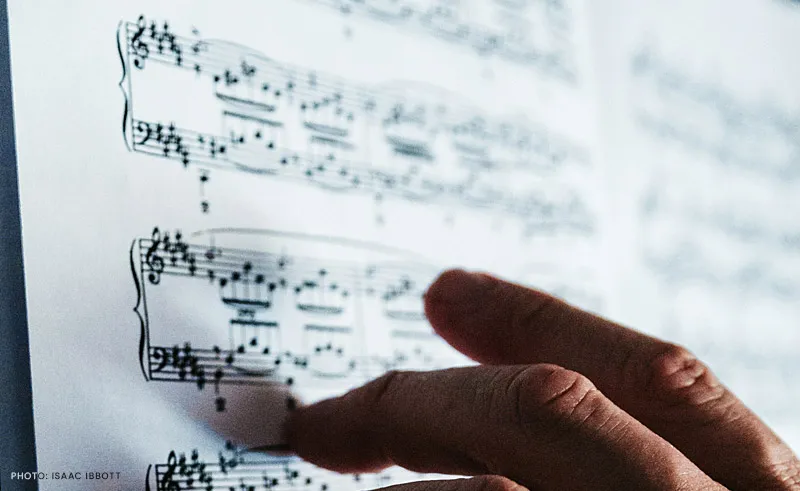 Hand on a music sheet